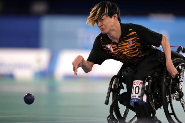 Photo of a man playing powerchair sport